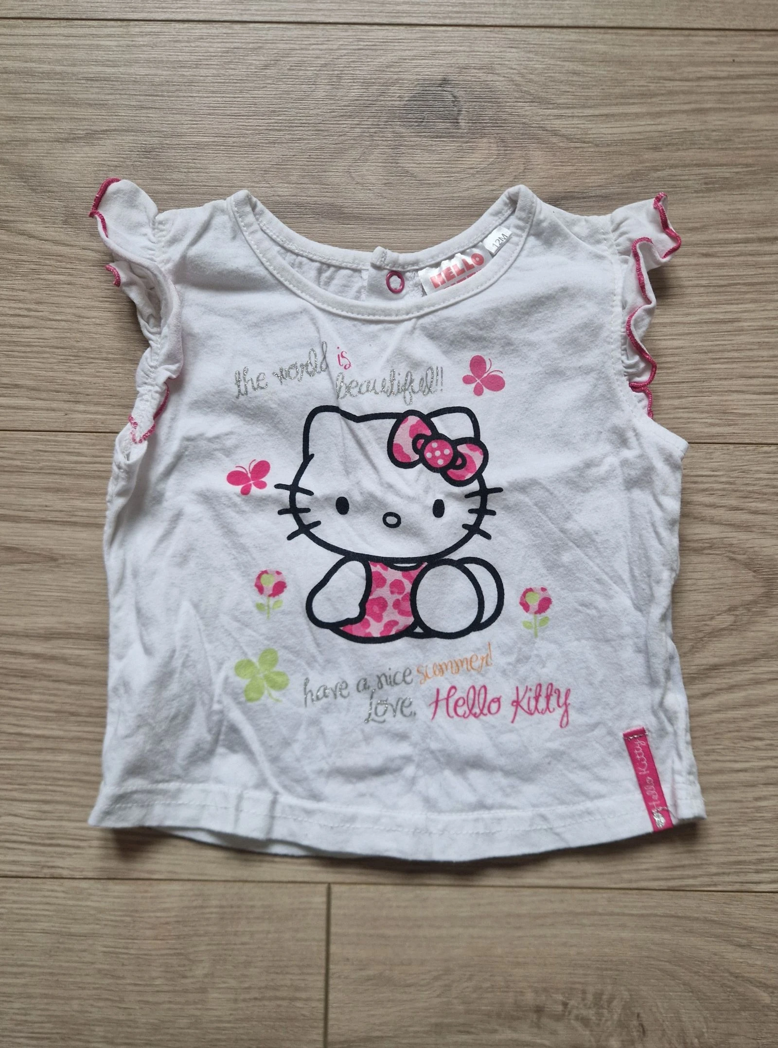 🐱 T‑shirt sans manches – Hello Kitty – bébé fille – 12 mois – très bon état